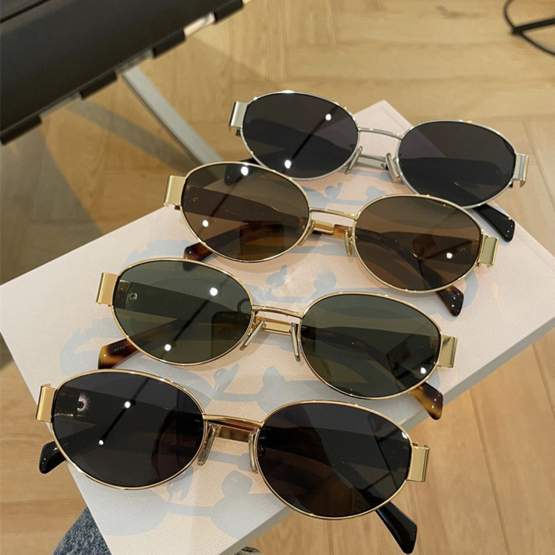 Women elegant oval sunglasses with gold-colored frame Kalsten