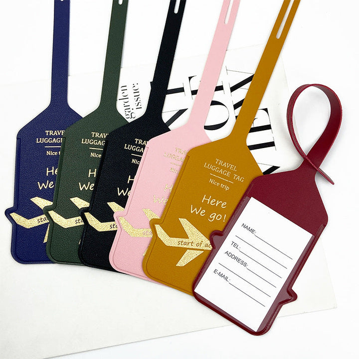 premium leather travel luggage ID tag with embossed airplane motif and adjustable strap Kalsten