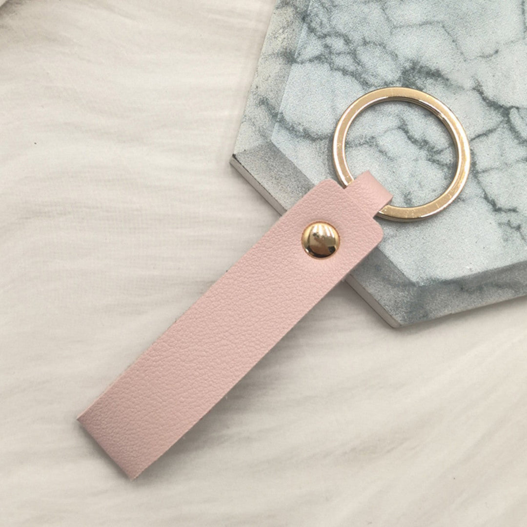 Unisex keychain made of high-quality synthetic leather with elegant metal embellishment Kalsten