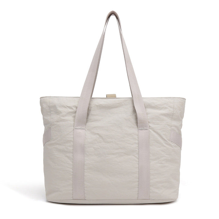 Stylish tote bag with spacious main compartment and reinforced handles Kalsten