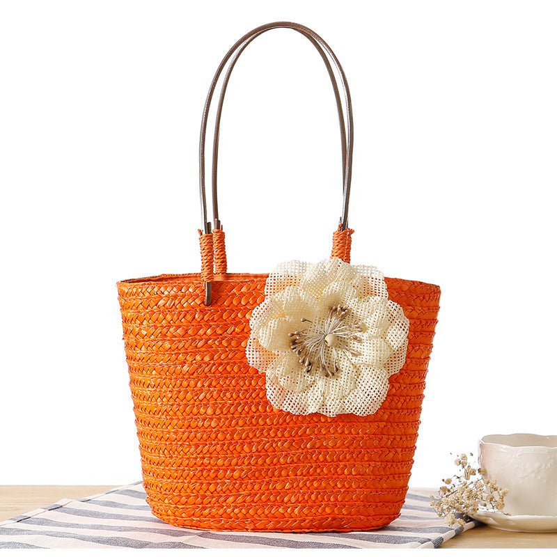 Elegant bast bag with flower appliqué Kalsten