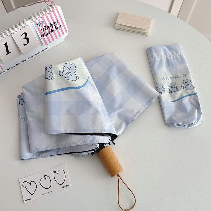 Women's Foldable Umbrella with Playful Checkered Pattern Kalsten