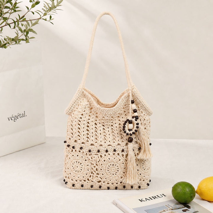 Macrame Drawstring Bag with Playful Tassels and Furniture Structure Kalsten