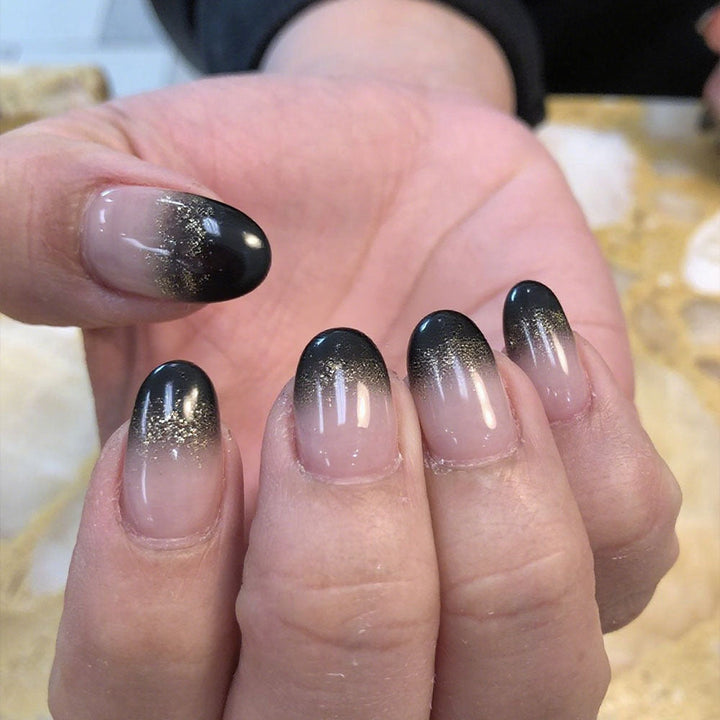 Artificial nails with elegant ombre design and sparkling accents Kalsten