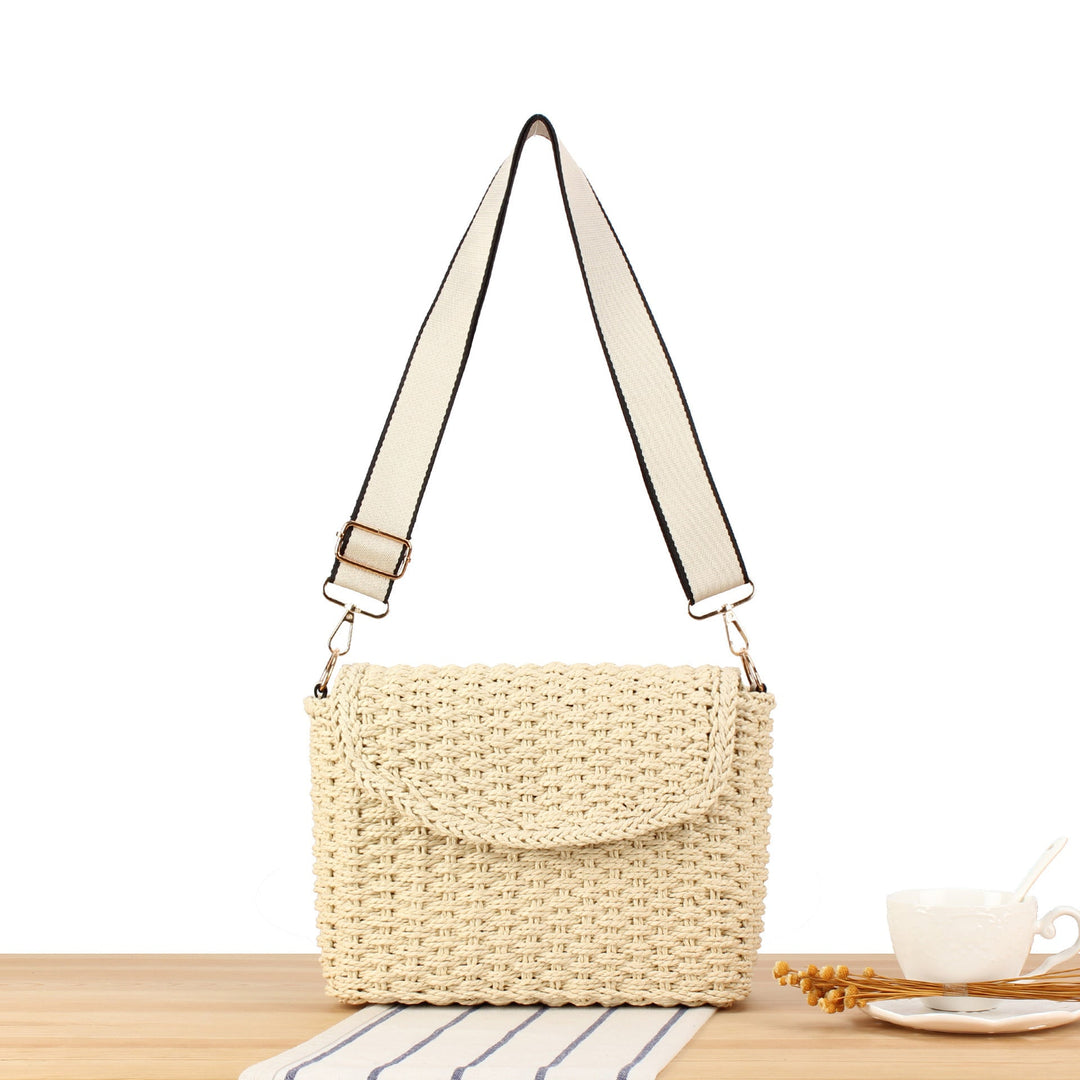 Handbag made of woven natural material with adjustable shoulder strap Kalsten
