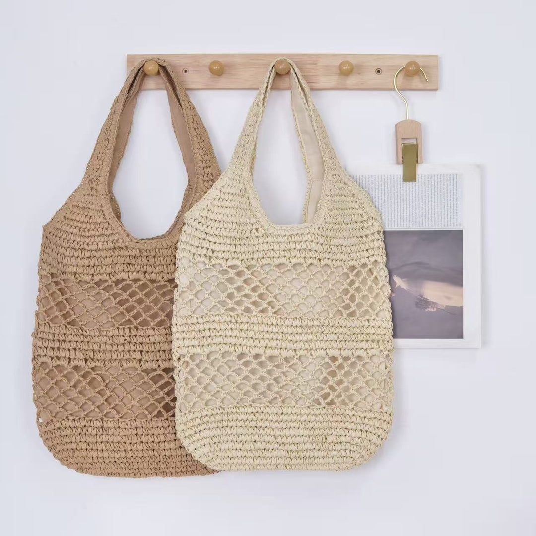 Handbag made of braided natural material with tassel details Kalsten