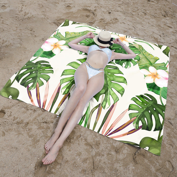 Beach blanket with vibrant floral pattern and innovative structure Kalsten