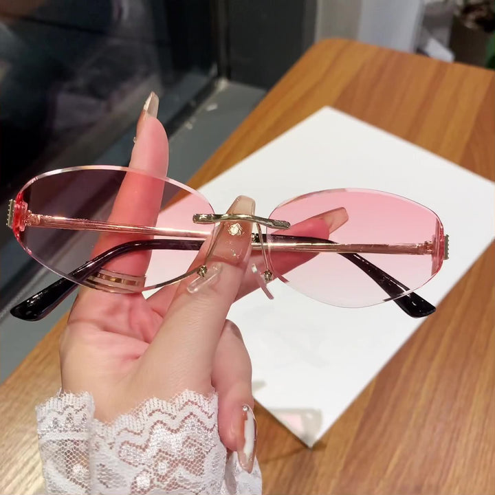 Ladies sunglasses in modern oval design with contrasting frame Kalsten