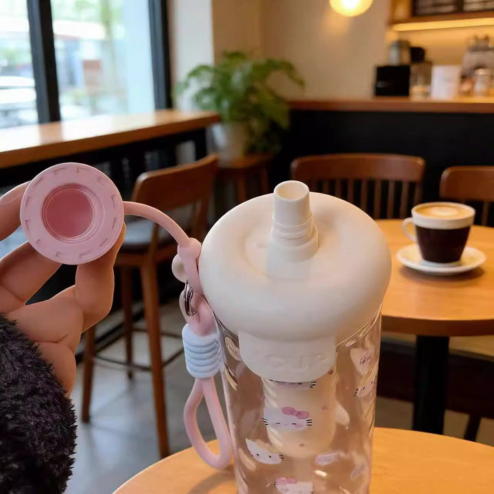 Women's water bottle with cheerful design and practical carrying handle Kalsten