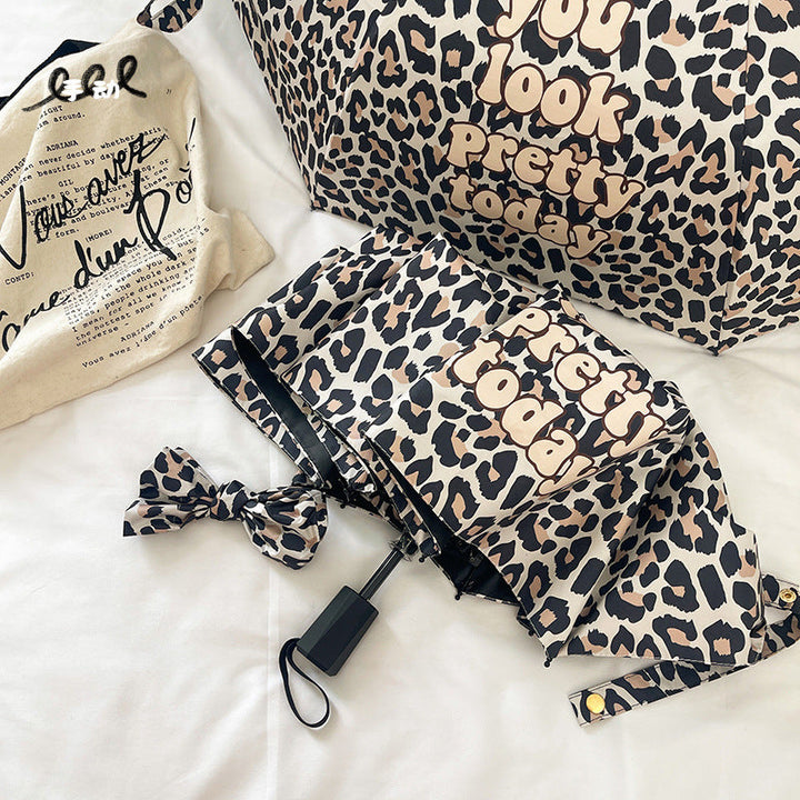 Women's Foldable Umbrella with Dynamic Leopard Pattern Kalsten
