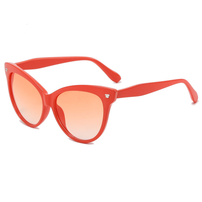 Ladies trendy cat-eye sunglasses with transparent frame and blue lenses Kalsten