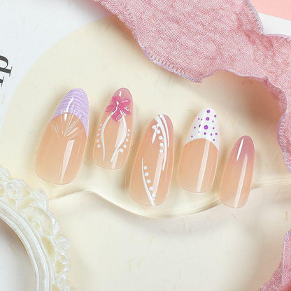 Nail art set with floral patterns and ombre effects Acalora