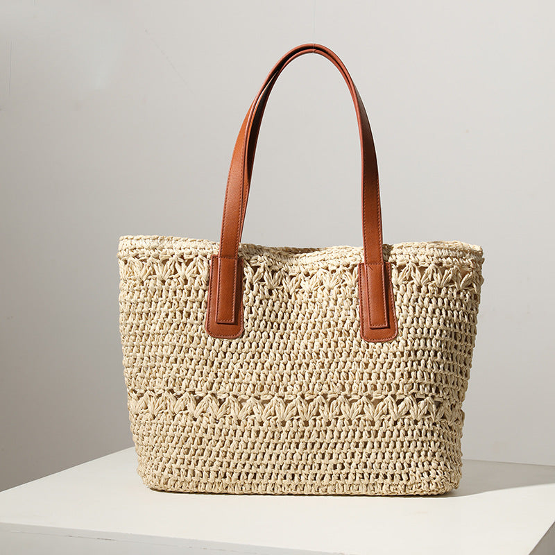 Braided straw bag with sturdy leather handles Kalsten