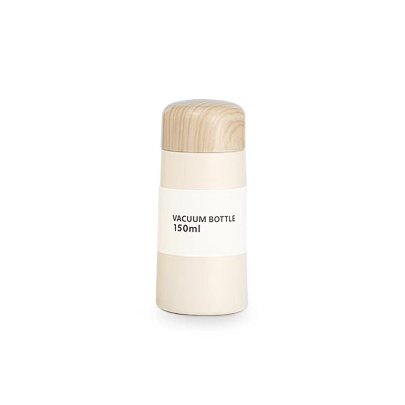 Women vacuum-insulated water bottle with innovative wooden lid Kalsten