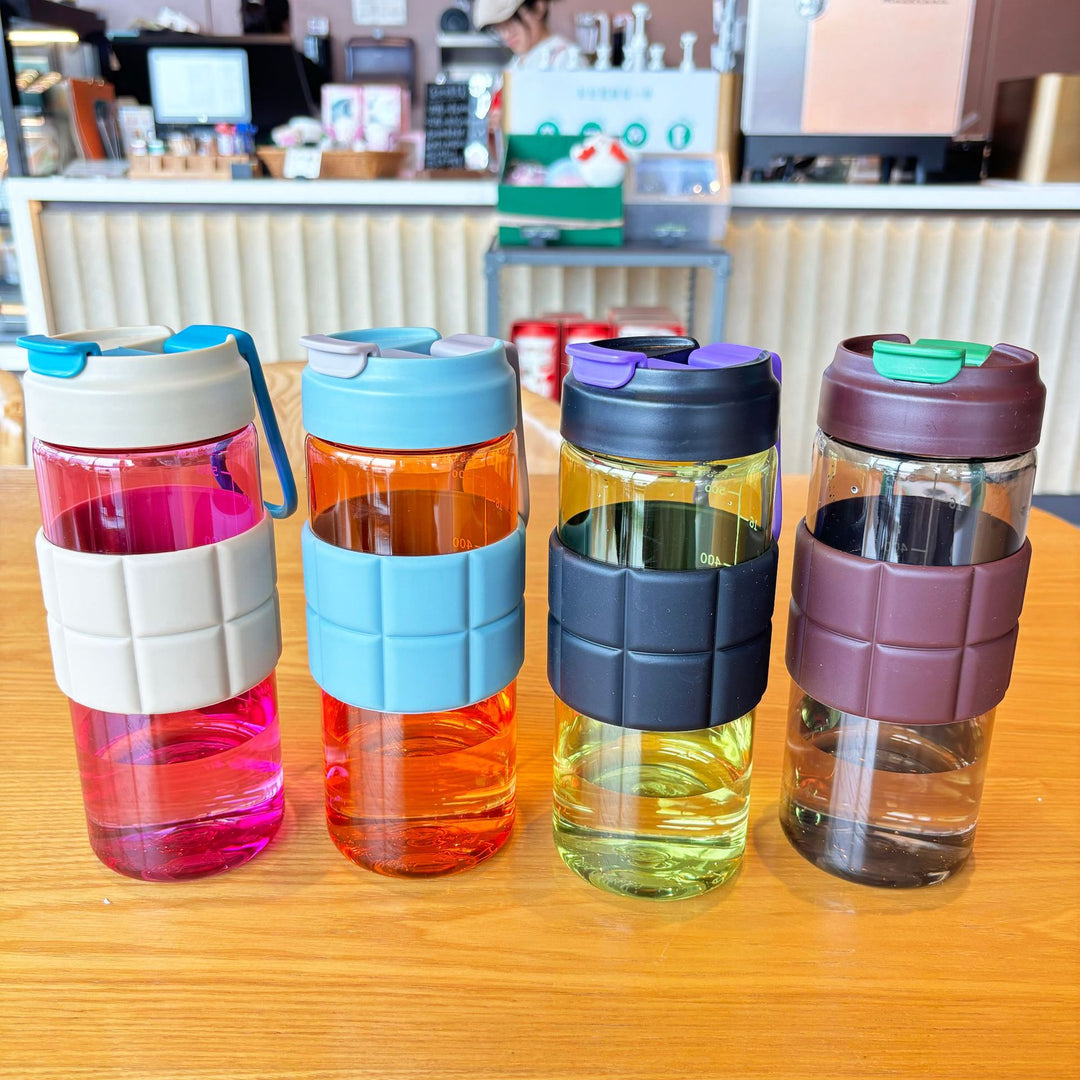 Women's transparent drinking bottle with non-slip silicone coating Kalsten