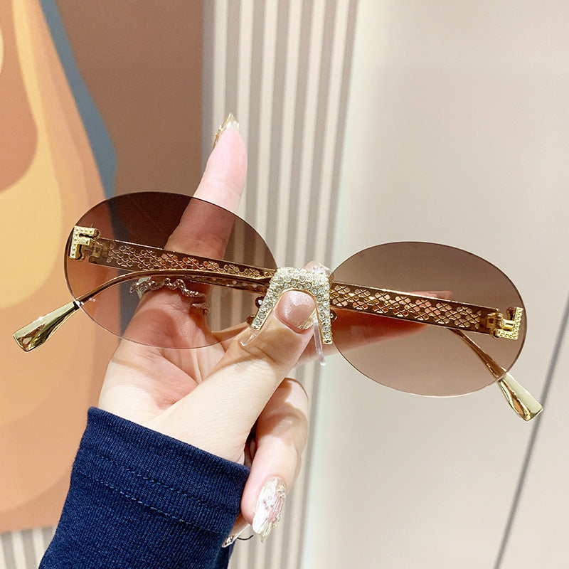 Women's sunglasses with glittering frame and oval lenses Kalsten