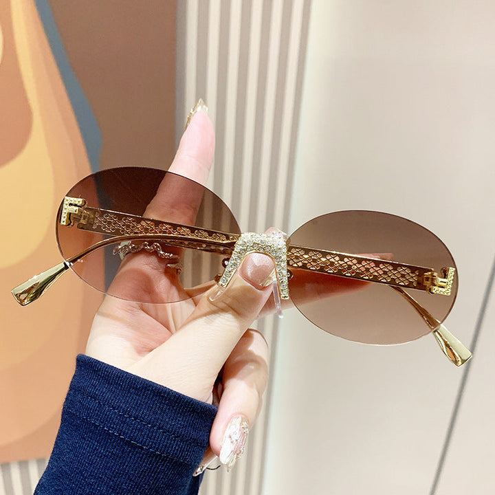 Women's sunglasses with glittering frame and oval lenses Kalsten