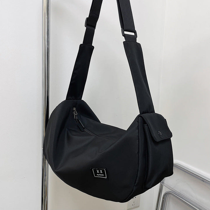 Sporty shoulder bag with adjustable carrying strap Kalsten