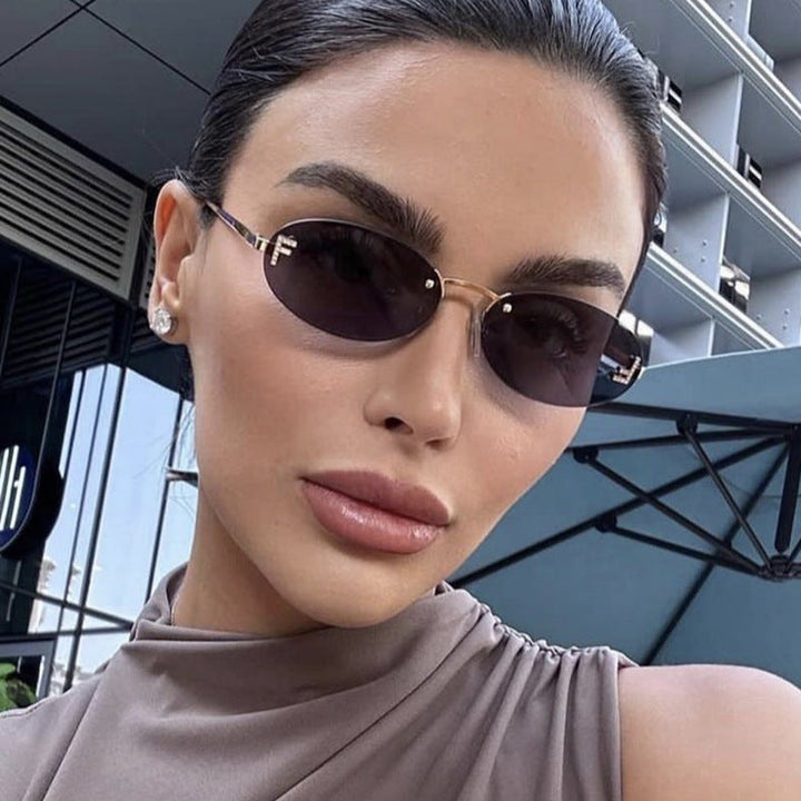 Women's fashionable sunglasses with elegant, round lenses and delicate metal frame Kalsten