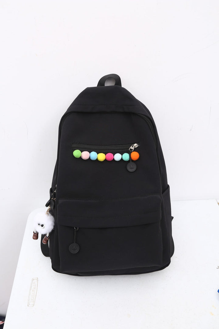 Practical backpack with colorful applications Kalsten