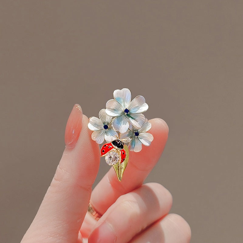 Flower brooch with ladybug and crystal Kalsten