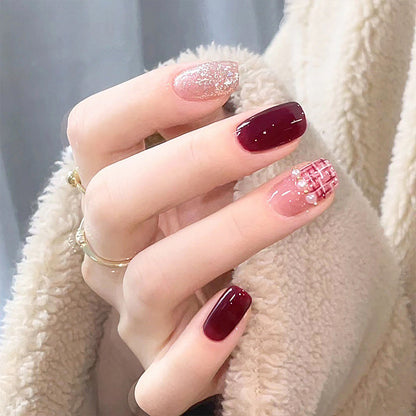 Artificial nail set with glamorous glitter and textural accents Acalora