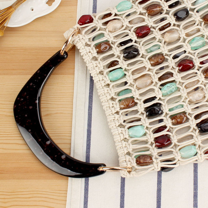 Fashionable handbag in creative net design with colorful accents Kalsten