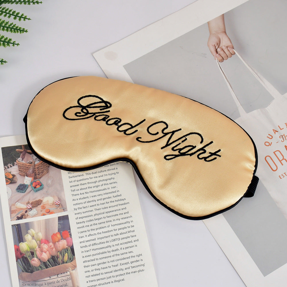 Unisex embroidered contoured sleep mask with decorative text embroidery and adjustable elastic band Kalsten