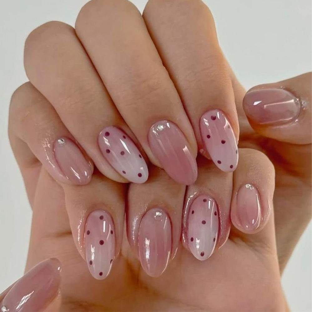 Artificial nails in a playful flower design with glittering accents Acalora