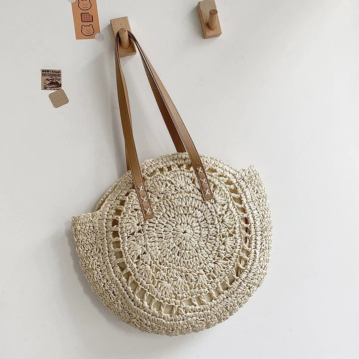 Round-woven beach bag with leather handles Kalsten