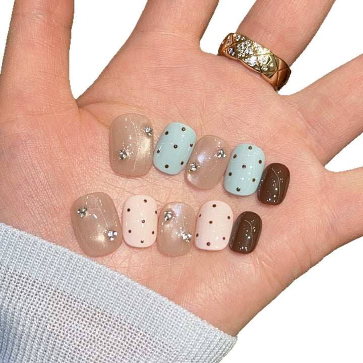 Acrylic nails with rhinestones and glitter Kalsten