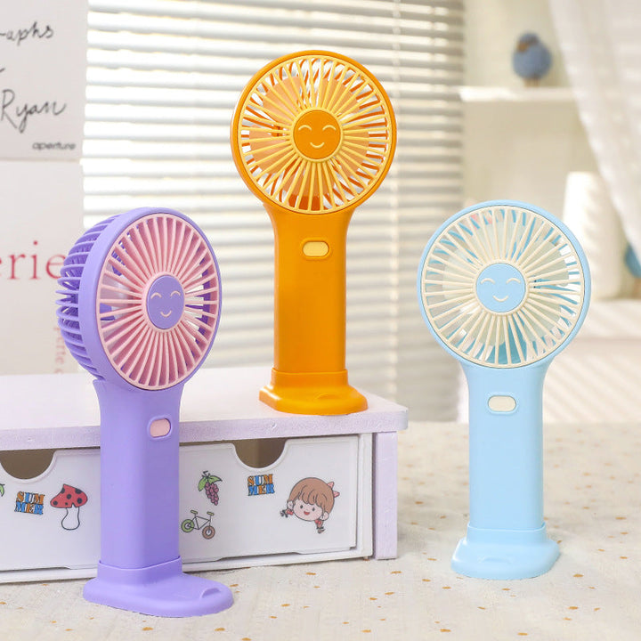 Ladies portable USB hand fan with innovative smiling design Kalsten