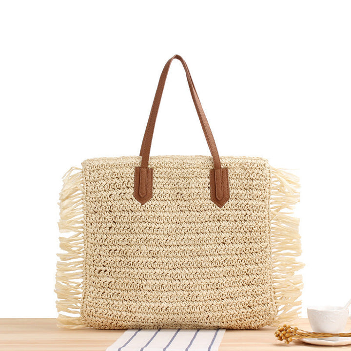 Beach bag with fringes and sturdy leather handles Kalsten