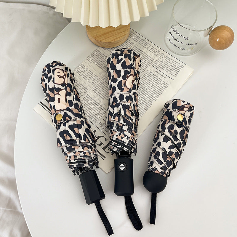 Women's Foldable Umbrella with Dynamic Leopard Pattern Kalsten