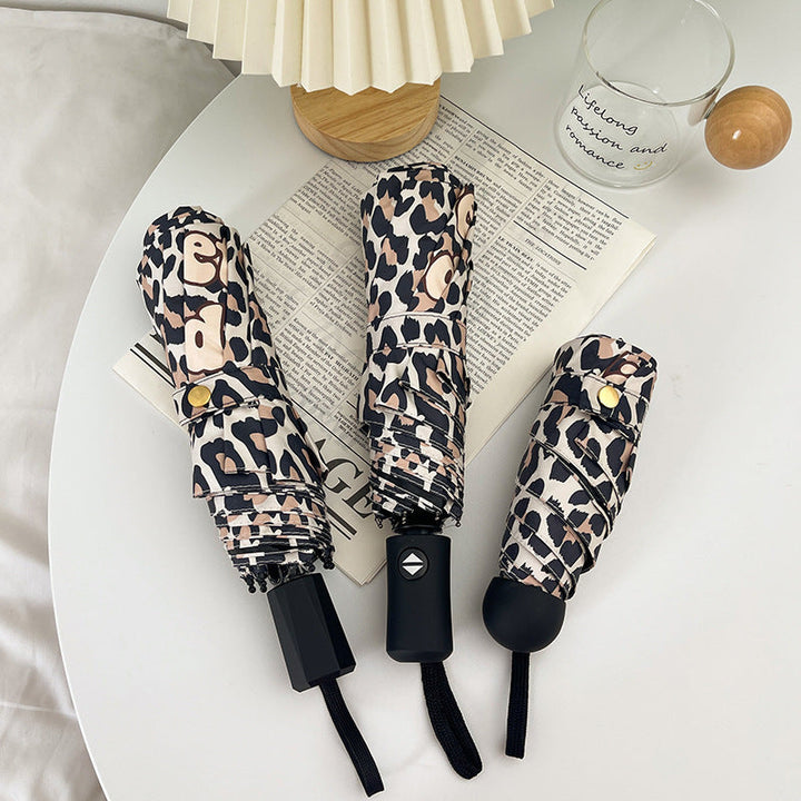 Women's Foldable Umbrella with Dynamic Leopard Pattern Kalsten