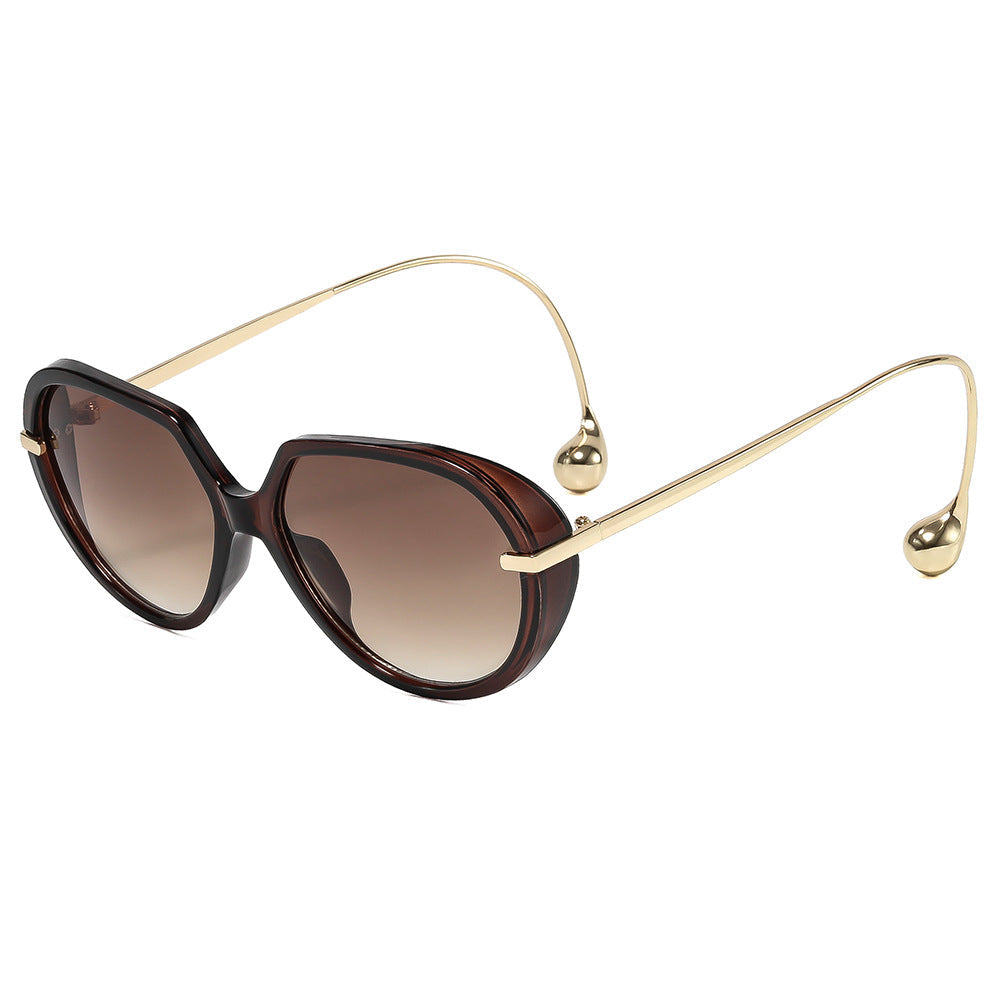 Women's Cat-Eye Sunglasses with Golden Accents and Stylish Frame Kalsten