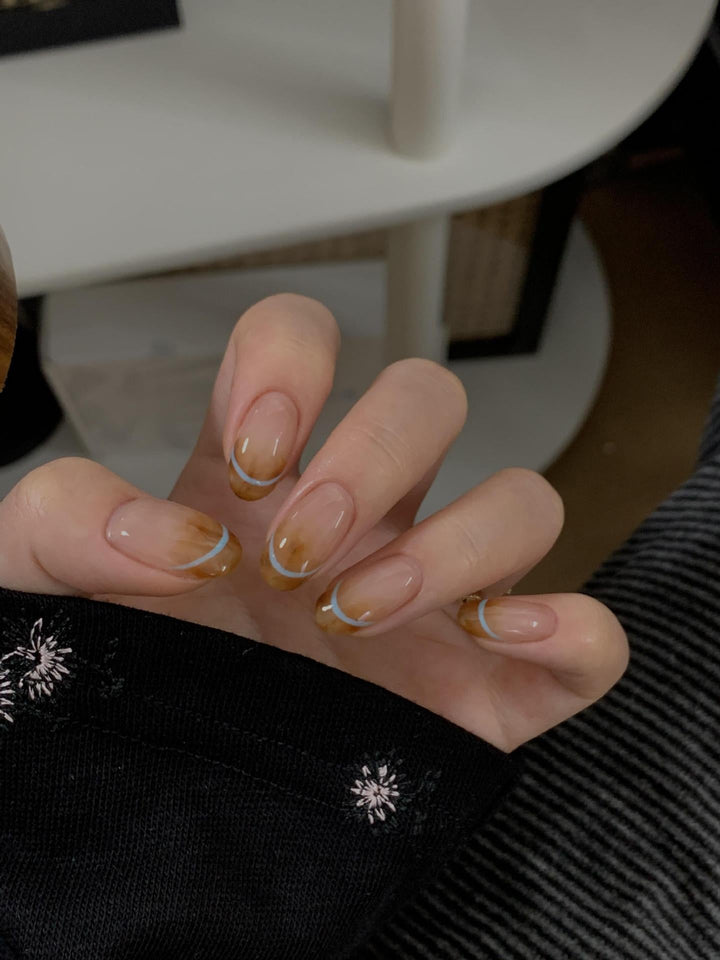 Artificial nails with modern French manicure design Kalsten