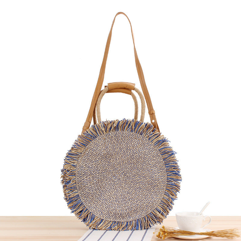 Round Bast shoulder bag with fringes and leather handles Kalsten