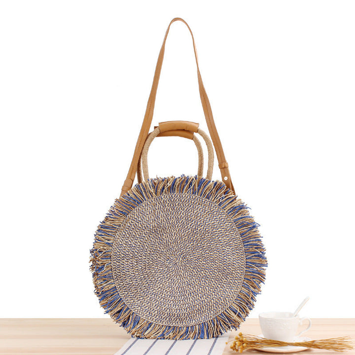 Round Bast shoulder bag with fringes and leather handles Kalsten