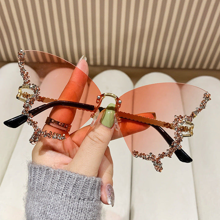Women's extravagant sunglasses with sparkling butterfly design Kalsten