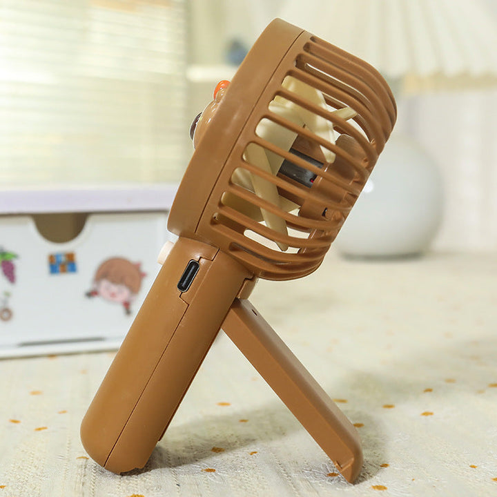 Unisex portable hand fan with bear motif and charging station Kalsten