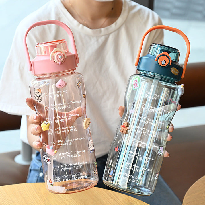 Women’s water bottle with integrated time marking and practical carrying handle Kalsten
