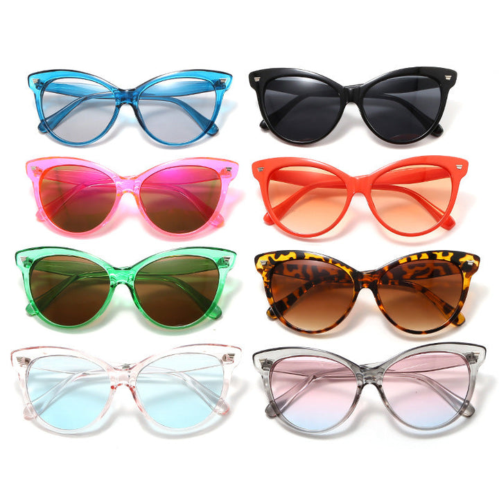 Ladies trendy cat-eye sunglasses with transparent frame and blue lenses Kalsten