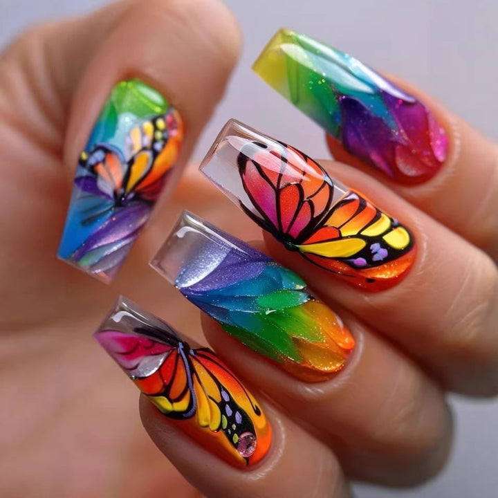 Artificial nails with colorful butterfly design and holographic accents Kalsten