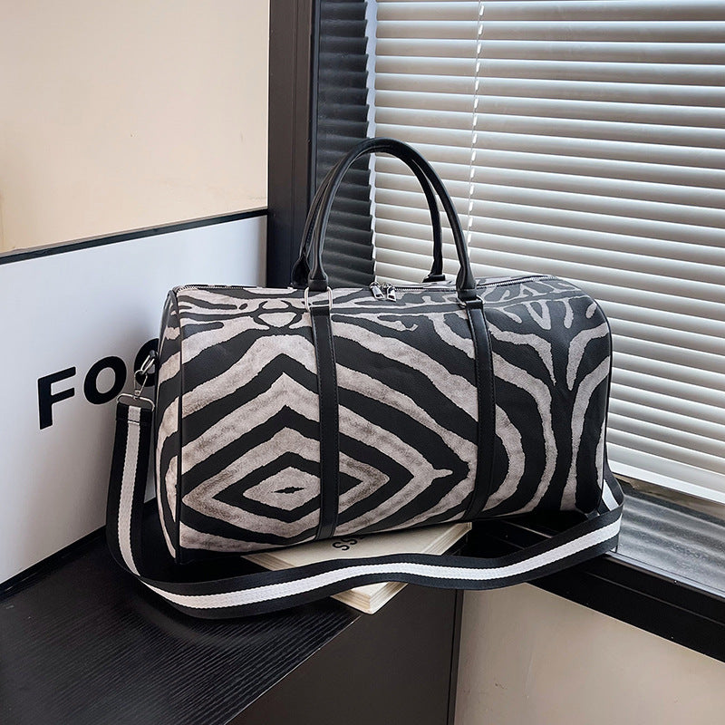 Sporty travel bag in trendy zebra pattern Kalsten