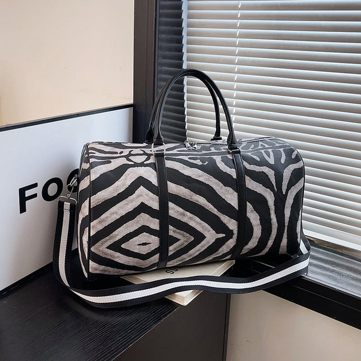 Sporty travel bag in trendy zebra pattern Kalsten