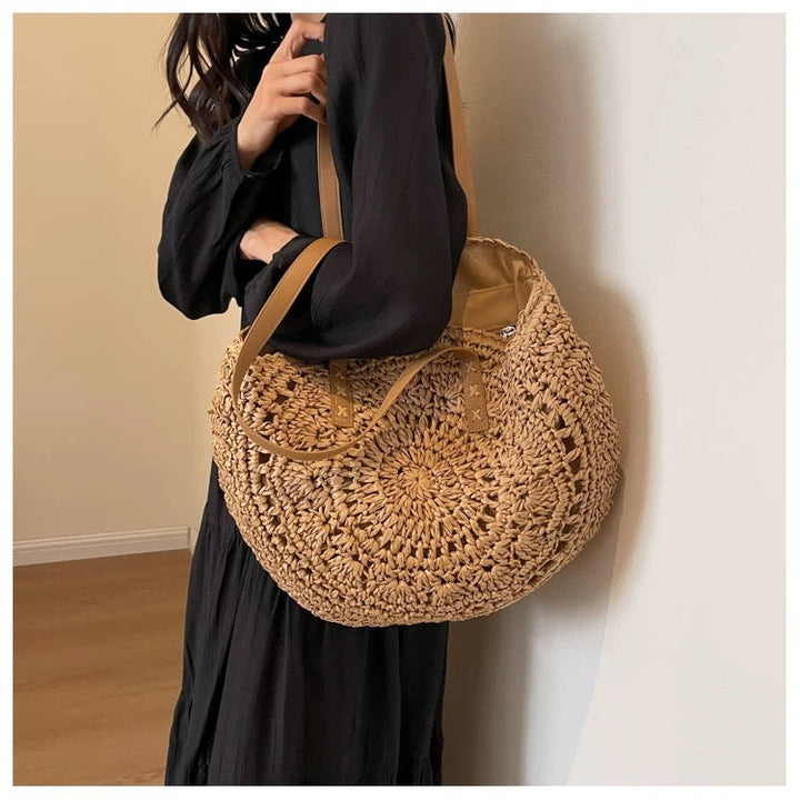 Round-woven beach bag with leather handles Kalsten