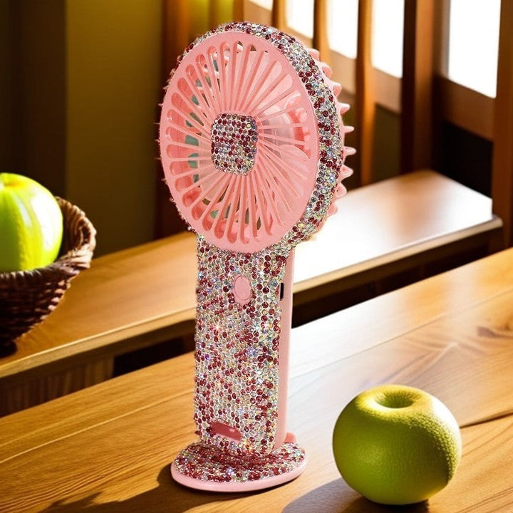 Women's portable hand fan rechargeable with rhinestone accents and cat emblem Kalsten