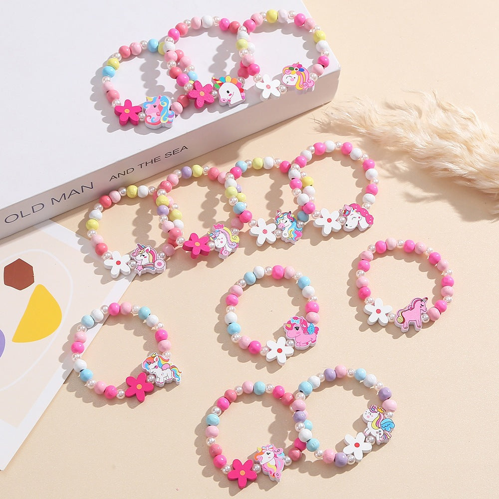 Playful children's bracelet with unicorn and flower motif Kalsten