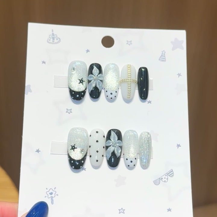 Glamorous artificial nail tips with floral accents Kalsten